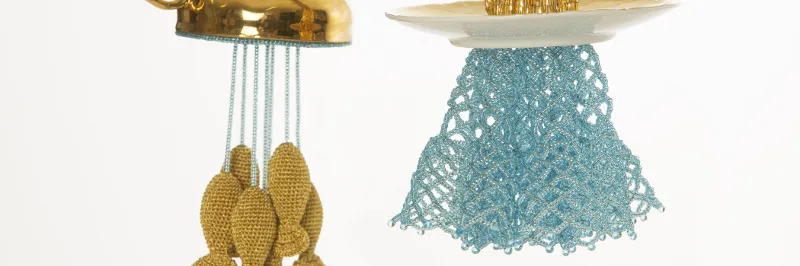 Cup%20of%20Golf%20Fish%20Tea%20on%20Beaded%20Water%202